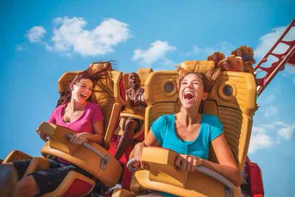 Guests screaming in joy on Rip Ride Rockit at Universal Studios Florida.